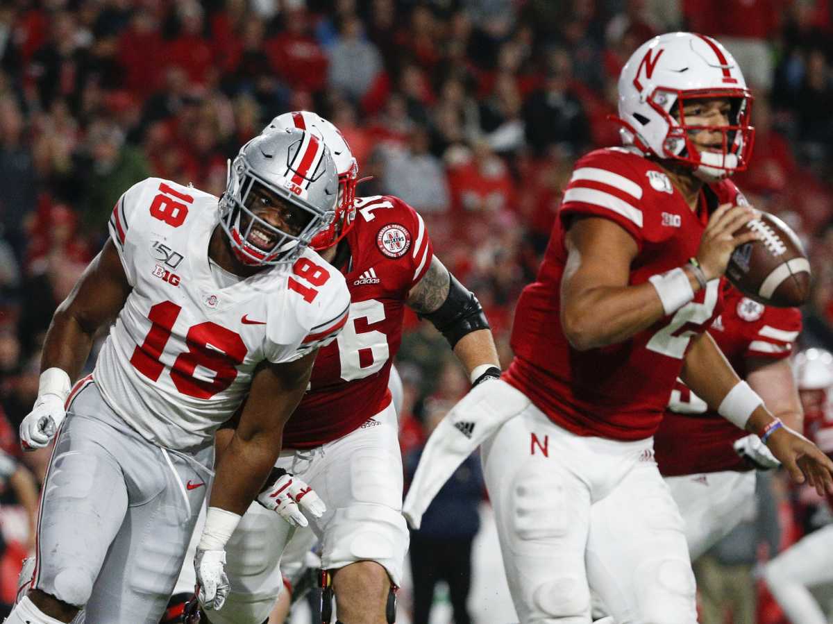 Jonathon Cooper pressures Taylor Martinez last season.