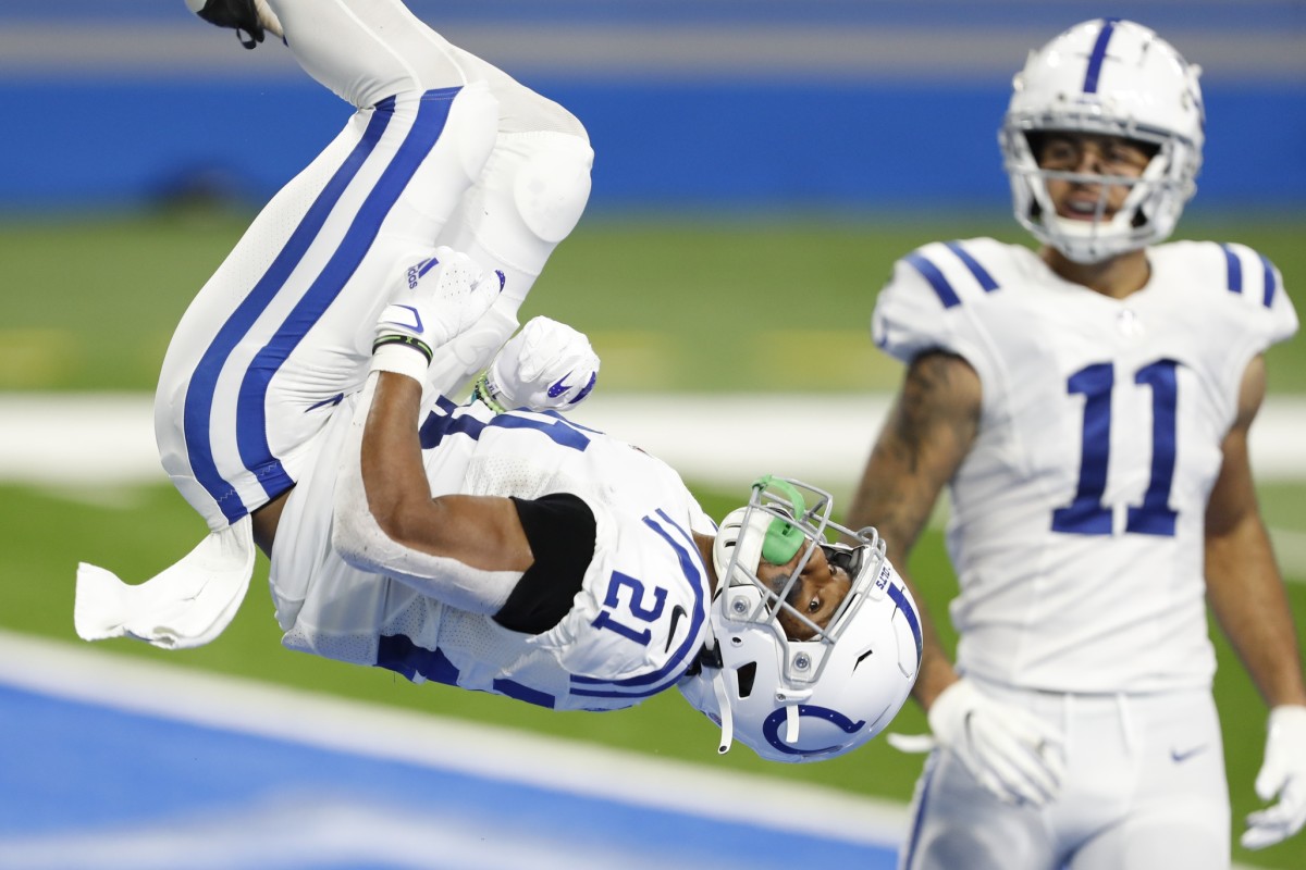 Indianapolis Colts running back Nyheim Hines does a backflip after scoring his second touchdown in a Sunday win at Detroit.