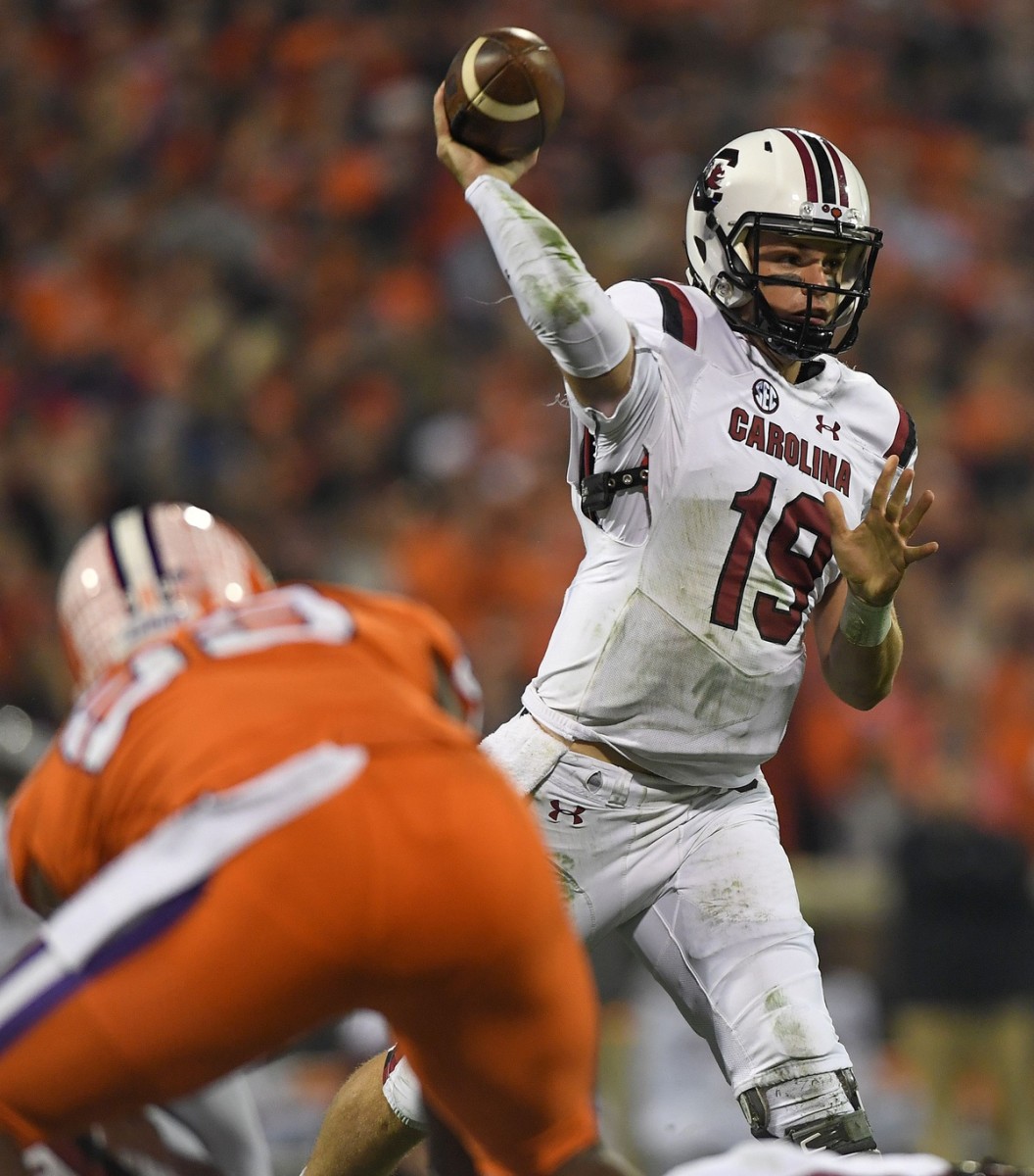 South Carolina quarterback Jake Bentley (19) passes against Clemson during the 1st quarter Saturday, November 24, 2018 at Clemson's Memorial Stadium. Bentley finished the game 32-of-50 for 510 yards and 5 touchdowns in the 56-35 loss.