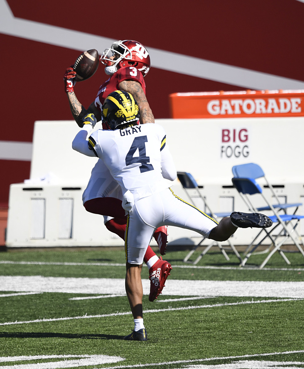 Indiana Hoosiers wide receiver Ty Fryfogle (3) caches a pass one handed against Michigan Wolverines defensive back Vincent Gray (4) during the first quarter of the game at Memorial Stadium.