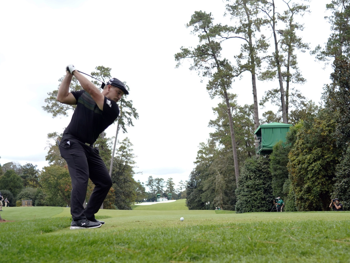 Nov 12, 2020; Augusta, Georgia, USA; Bryson DeChambeau plays his shot from the 18th tee during the first round of The Masters golf tournament at Augusta National GC.