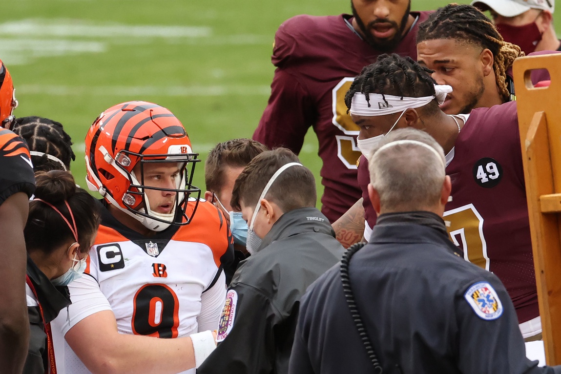 Reactions: Bengals quarterback Joe Burrow limps off field during