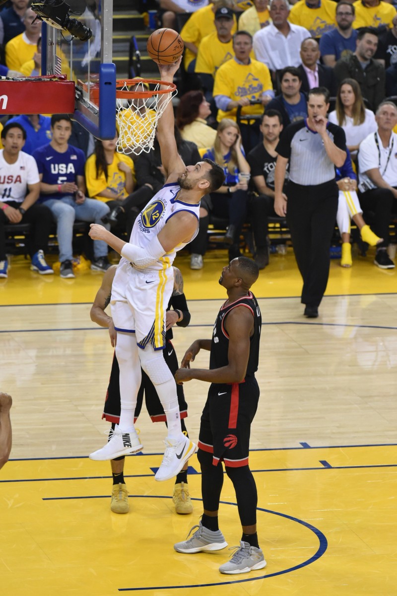 June 5, 2019; Oakland, CA, USA; Golden State Warriors center Andrew Bogut (12) shoots the basketball against Toronto Raptors center Serge Ibaka (9) during the first half in game three of the 2019 NBA Finals at Oracle Arena. The Raptors defeated the Warriors 123-109 to lead the series 2-1.