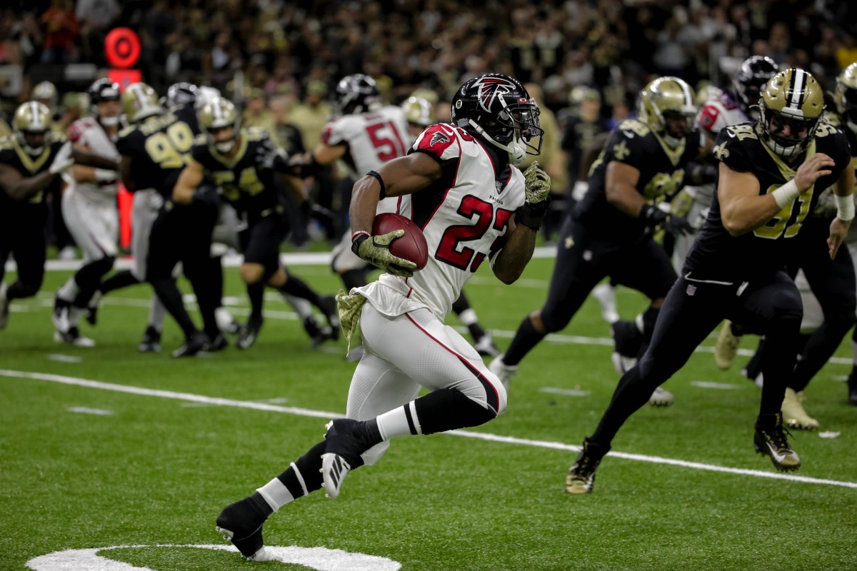 Nov 10, 2019; New Orleans, LA, USA; Atlanta Falcons running back Brian Hill (23) runs against the New Orleans Saints during the third quarter at the Mercedes-Benz Superdome. Mandatory Credit: Derick E. Hingle-USA TODAY 