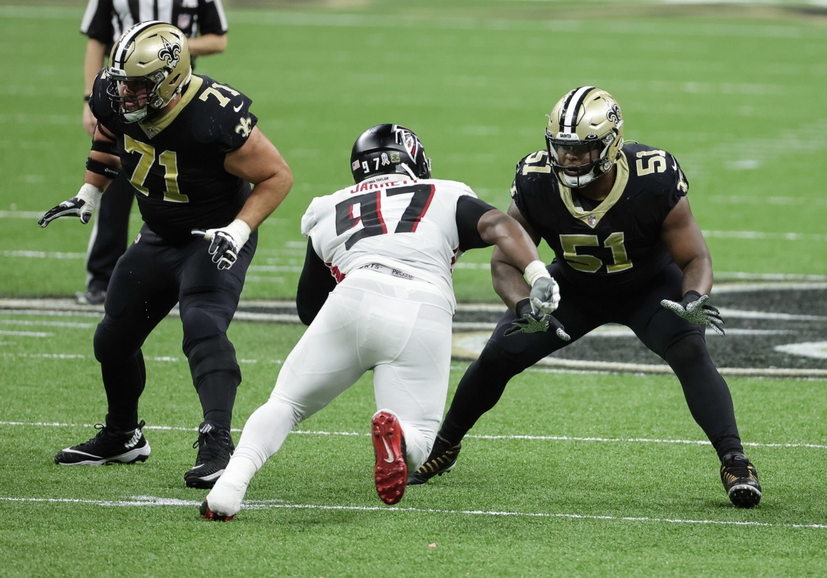 Atlanta Falcons linebacker Demorrio Williams (51) tries to tackle