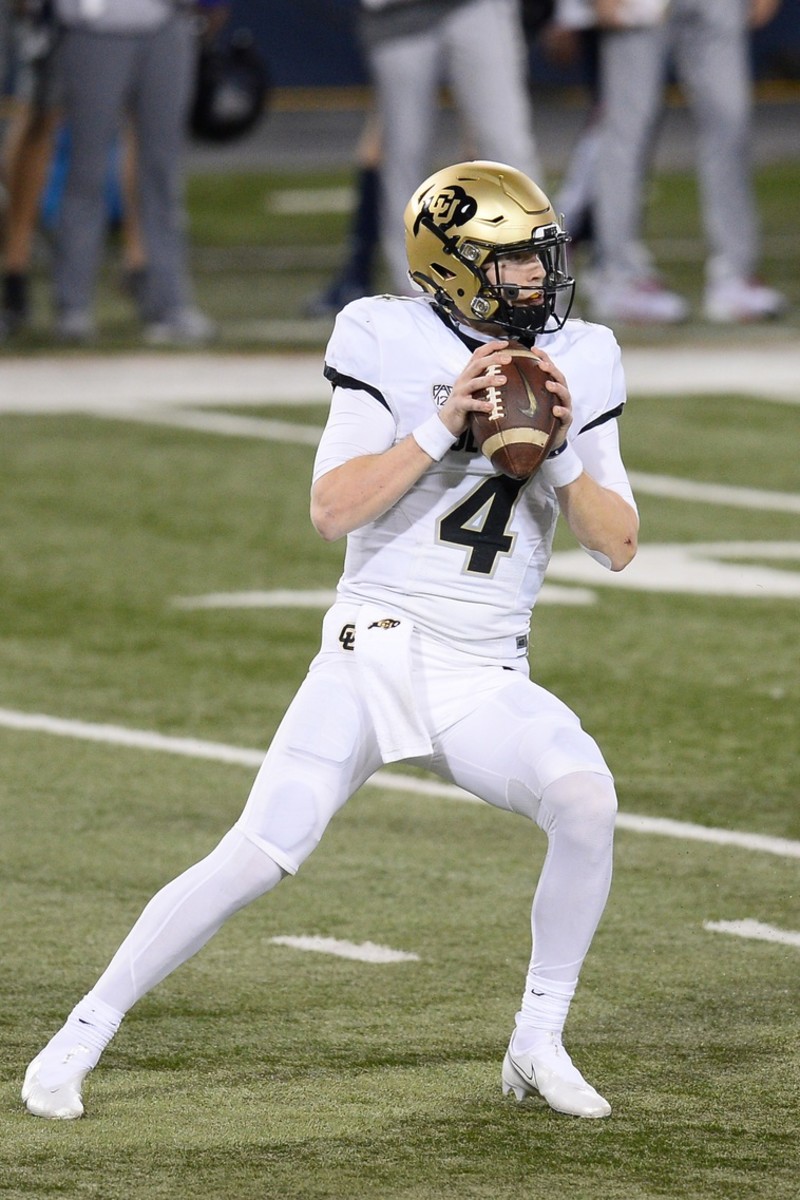 Dec 5, 2020; Tucson, Arizona, USA; Colorado Buffaloes quarterback Sam Noyer (4) drops back to pass against the Arizona Wildcats during the first half at Arizona Stadium.