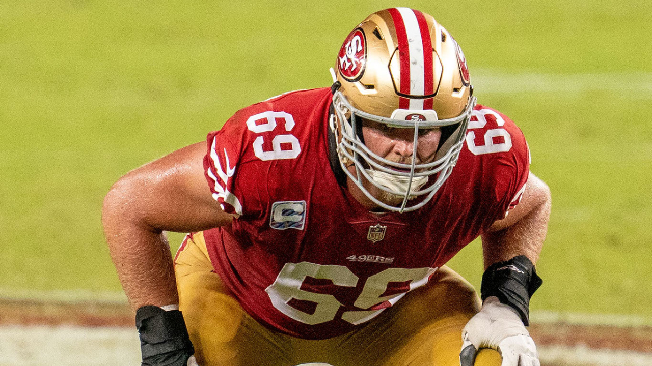 San Francisco 49ers Mike McGlinchey (69) walks on the field with a shirt  displaying Crucial Catch during an NFL football game against the Seattle  Seahawks, Sunday, October 3, 2021, in Santa Clara