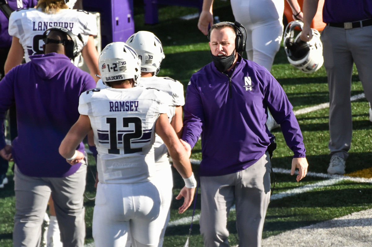 Northwestern quarterback Peyton Ramsey looks to pass during the second half  of an NCAA college football game against Northwestern, Saturday, Oct. 31,  2020, in Iowa City, Iowa. (AP Photo/Charlie Neibergall Stock Photo 