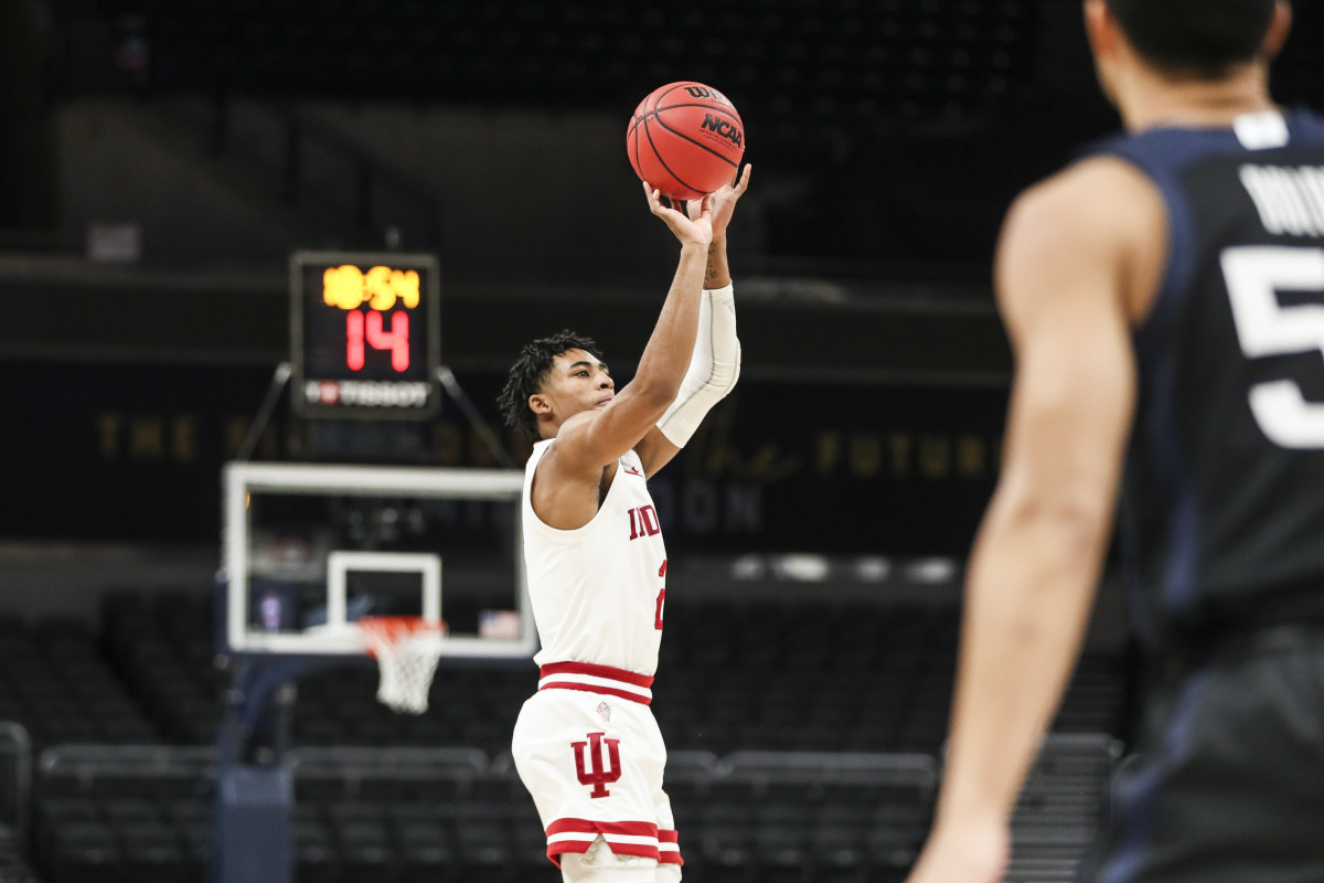 Indiana guard Armaan Franklin nails one of his four first-half three-pointers against Butler on Saturday (Photos courtesy of IU Athletics)