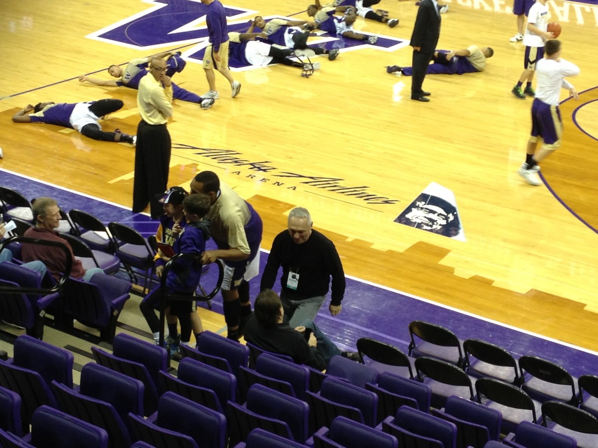 Robert Upshaw poses with a young fan for a selfie.