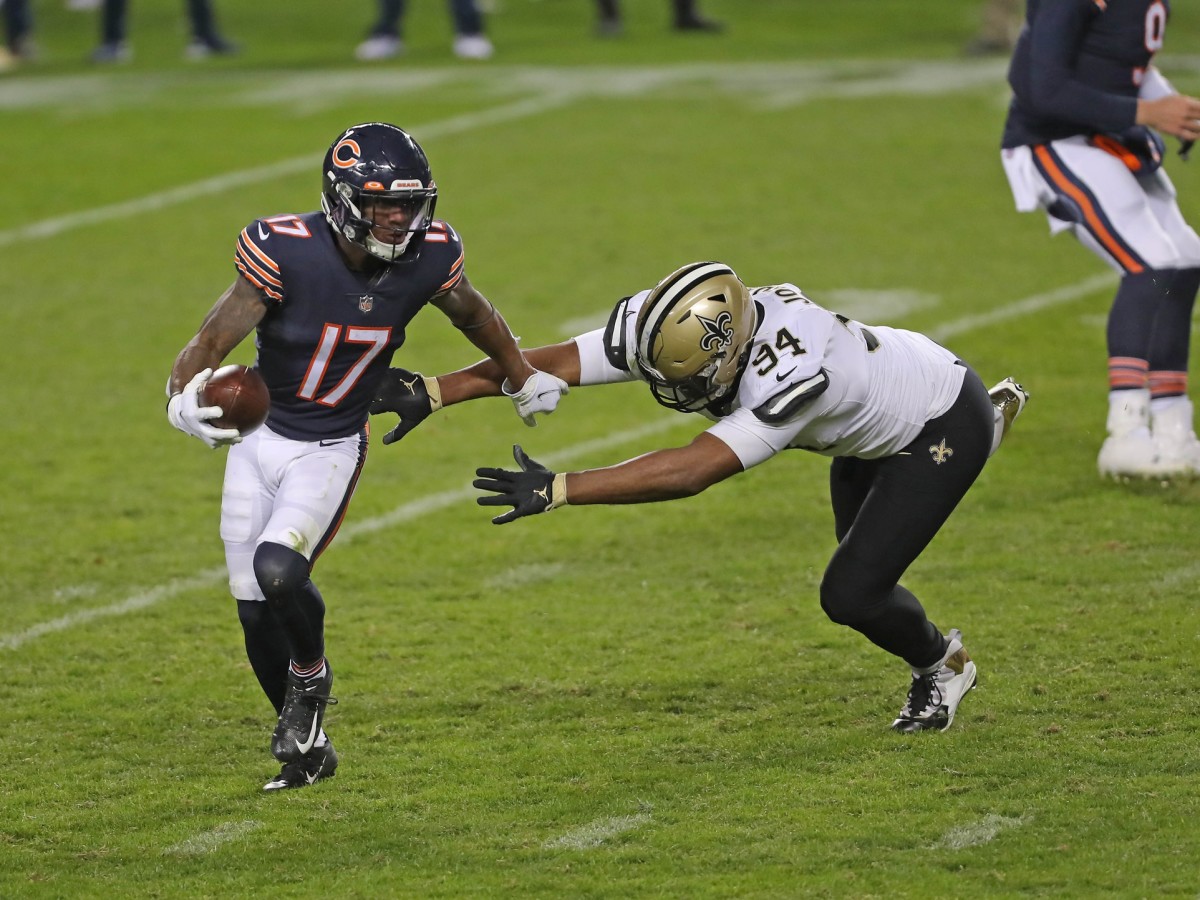 Nov 1, 2020; Chicago, Illinois, USA; Chicago Bears wide receiver Anthony Miller (17) running past New Orleans Saints defensive end Cameron Jordan (94) during the second half at Soldier Field. Mandatory Credit: Dennis Wierzbicki-USA TODAY 