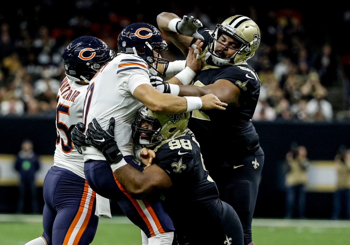 Oct 29, 2017; New Orleans, LA, USA; New Orleans Saints defensive tackle Sheldon Rankins (98) hits Chicago Bears quarterback Mitchell Trubisky (10) as a he throws a pass during a game at the Mercedes-Benz Superdome. The Saints defeated the Bears 20-12. Mandatory Credit: Derick E. Hingle-USA TODAY