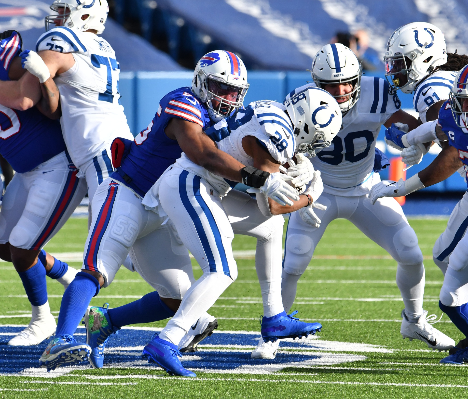 Bills fight off Colts rally for first playoff win since 1995