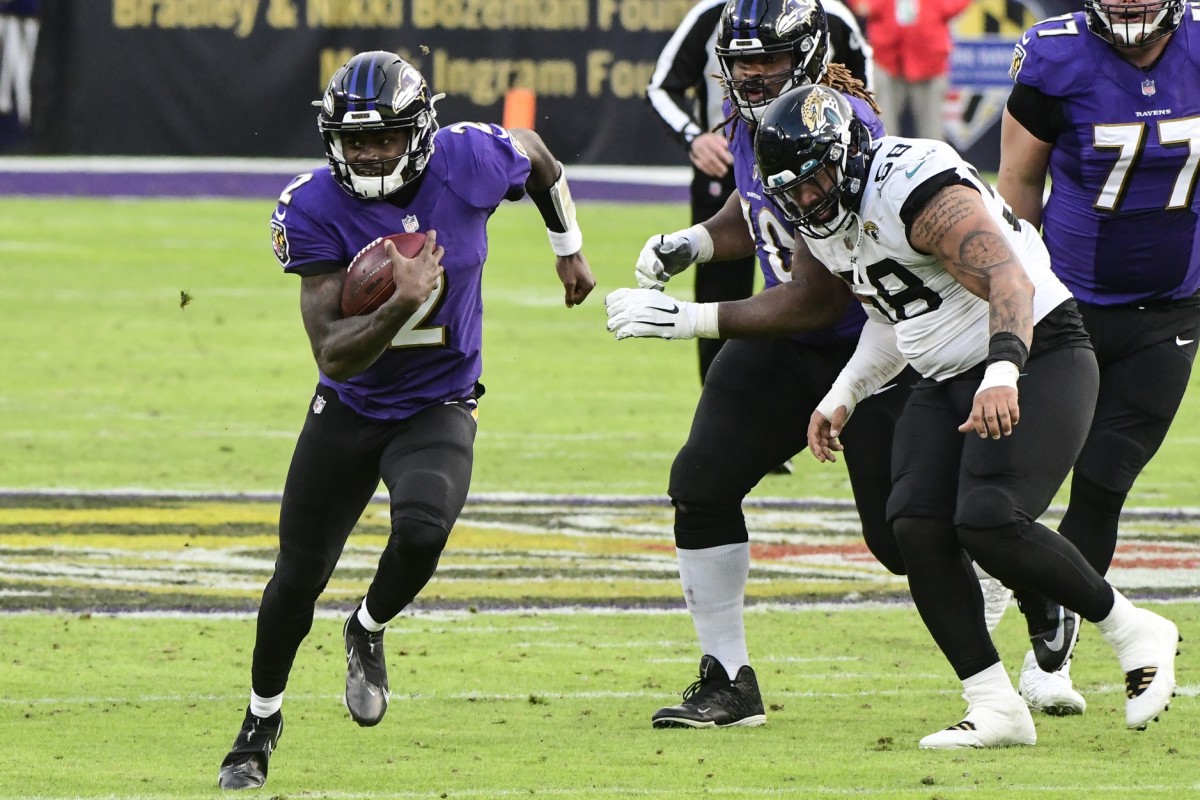 Dec 20, 2020; Baltimore, Maryland, USA; Baltimore Ravens quarterback Tyler Huntley (2) runs during the fourth quarter against the Jacksonville Jaguars at M&T Bank Stadium.