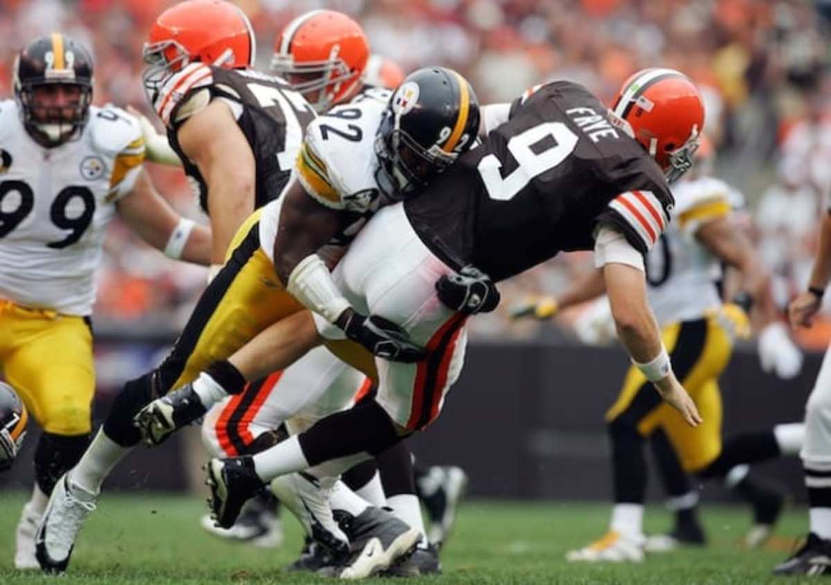 Cleveland Browns quarterback Charlie Frye gets sacked during the