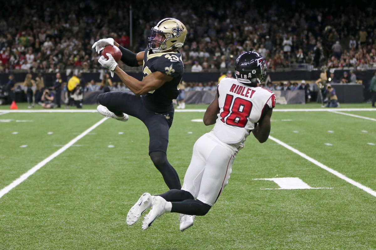 Nov 10, 2019; New Orleans, LA, USA; New Orleans safety Marcus Williams (43) intercepts a pass intended for Atlanta receiver Calvin Ridley (18) in the second half at the Mercedes-Benz Superdome. Mandatory Credit: Chuck Cook-USA TODAY 