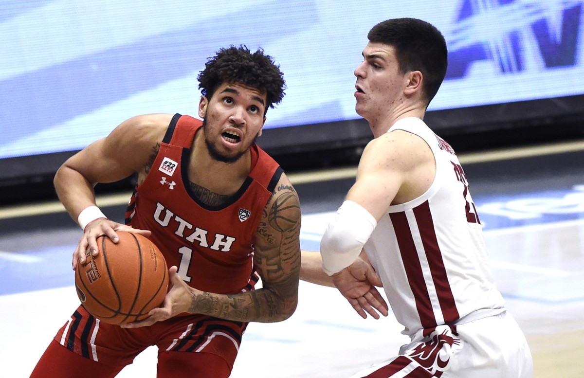 Jan 21, 2021; Pullman, Washington, USA; Utah Utes forward Timmy Allen (1) goes up for a basket against Washington State Cougars forward Andrej Jakimovski (23) in the second half of a Pac-12 men s basketball game at Friel Court at Beasley Coliseum. Utah won 71-56.