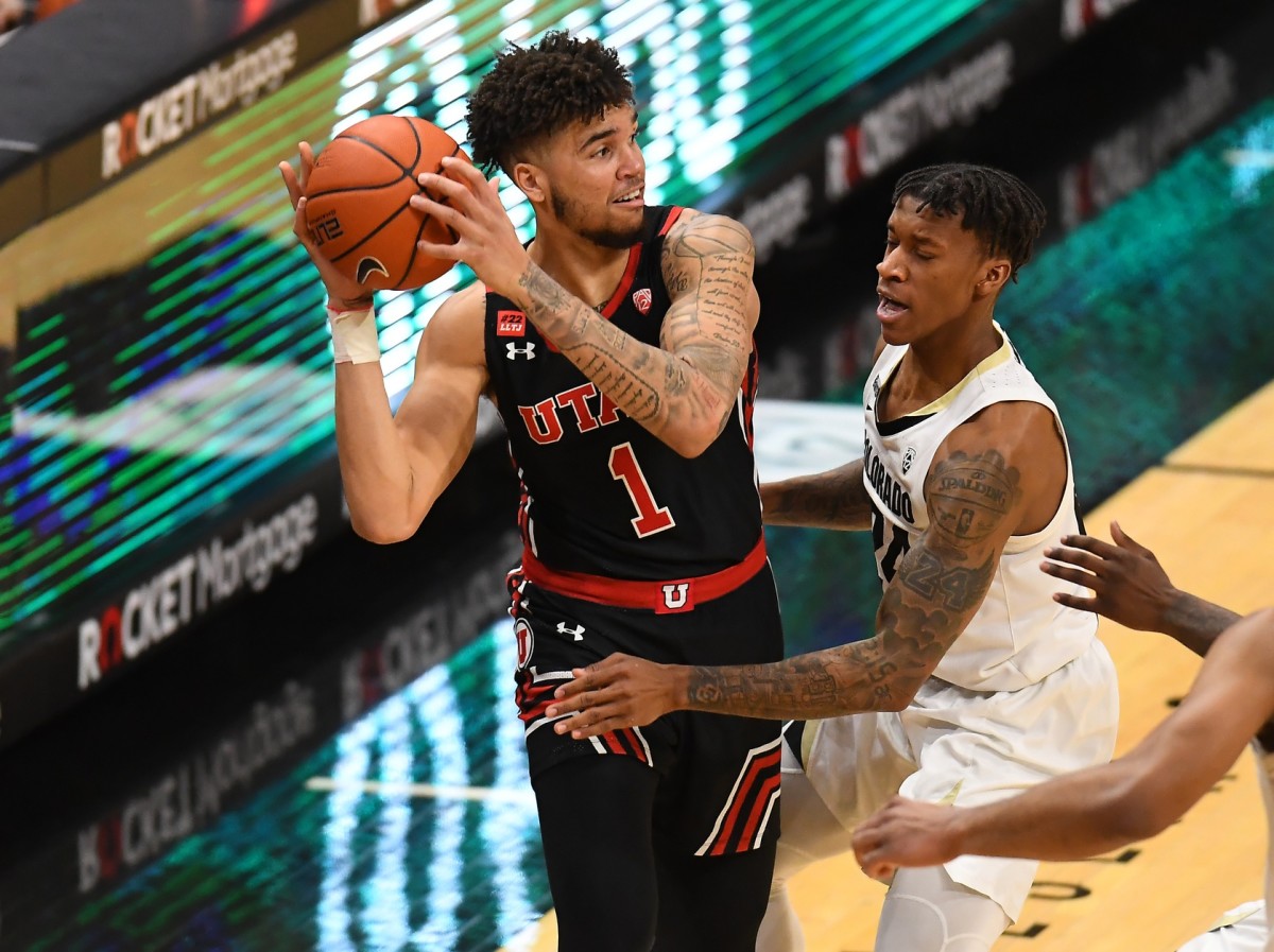 Jan 30, 2021; Boulder, Colorado, USA; Colorado Buffaloes guard Eli Parquet (24) guards Utah Utes forward Timmy Allen (1) in the second half at the CU Events Center.