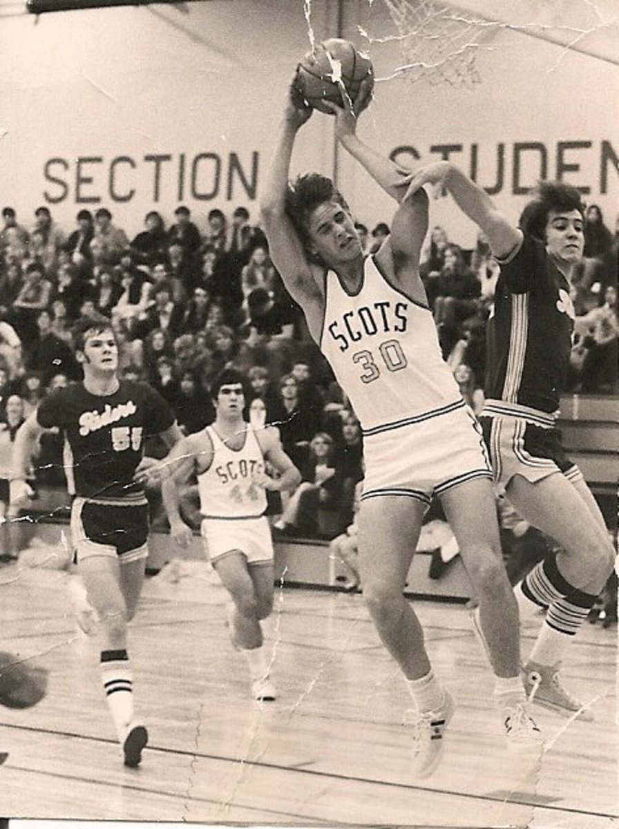 Ray Pinney gets fouled by some guy named Dan Raley.