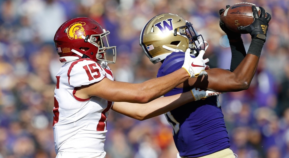 Cam Williams steals a pass against USC in 2019.