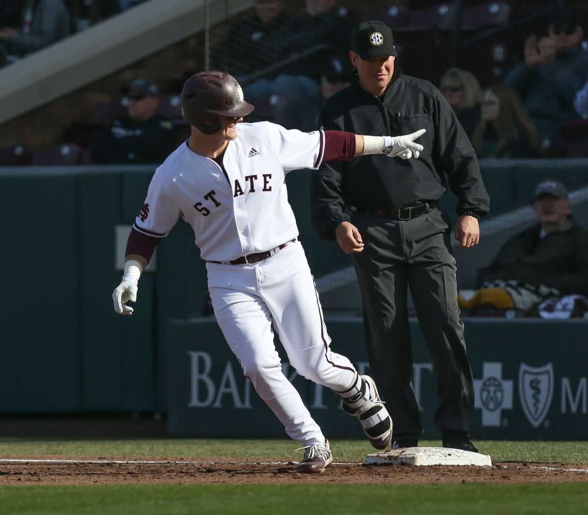 Mississippi State catcher Logan Tanner rounds first base after hitting a home run last season. (Photo by Keith Warren)