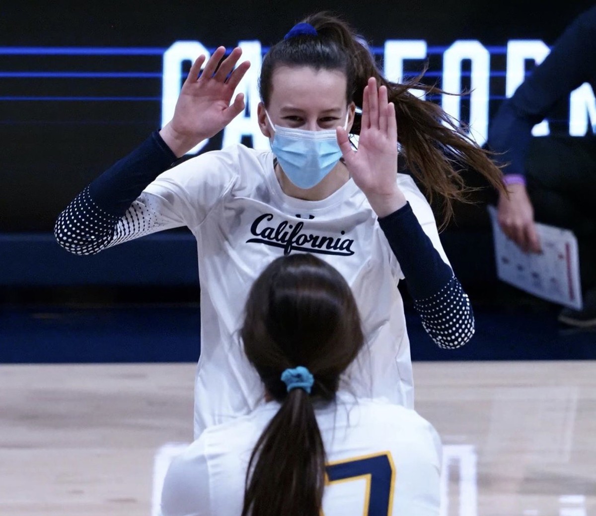 Cal freshman Lydia Grote celebrates with a teammate