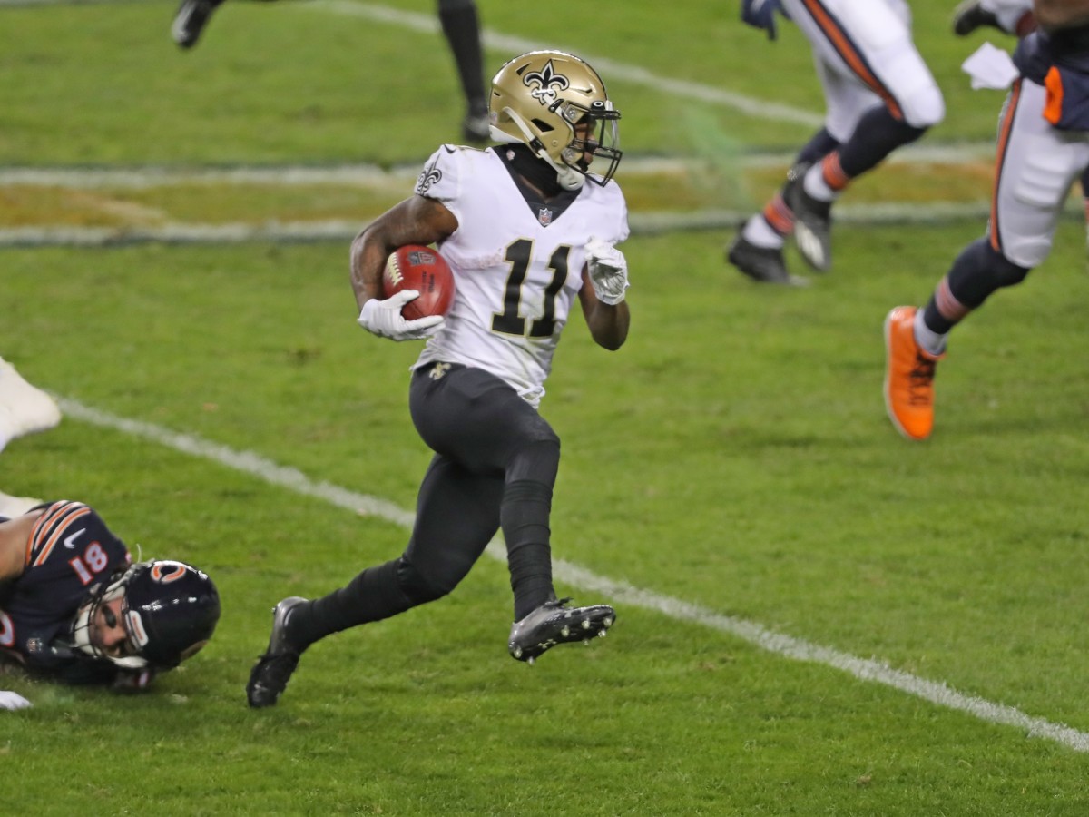 New Orleans Saints wide receiver Deonte Harris (11) returns a kickoff in  the first half of an NFL football game against the Carolina Panthers in New  Orleans, Sunday, Jan. 2, 2022. (AP