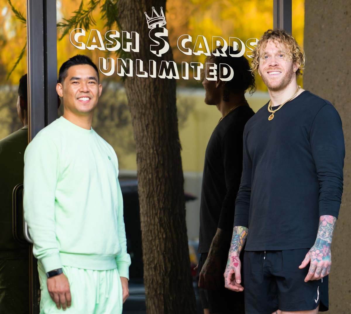 Cassius Marsh and business manager Nick Nugwynne outside their new store selling collectible cards in Westlake Village, California