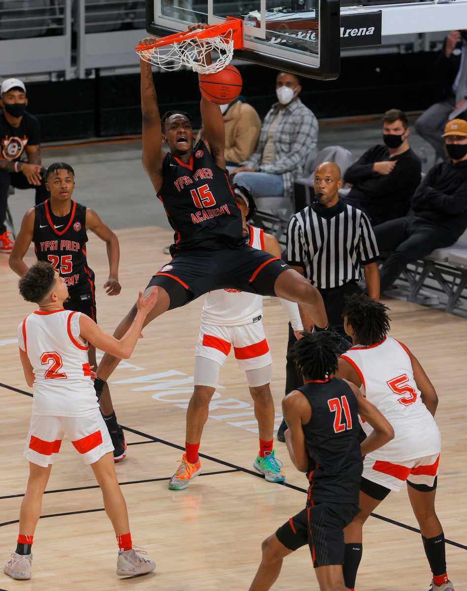 Ypsi Prep's Shawn Phillips dunks with authority during the second half of the game between Ypsi Prep Academy and Henderson, Nevada's Air Nado Coronado at The Battle Basketball Showcase at Dickies Arena.