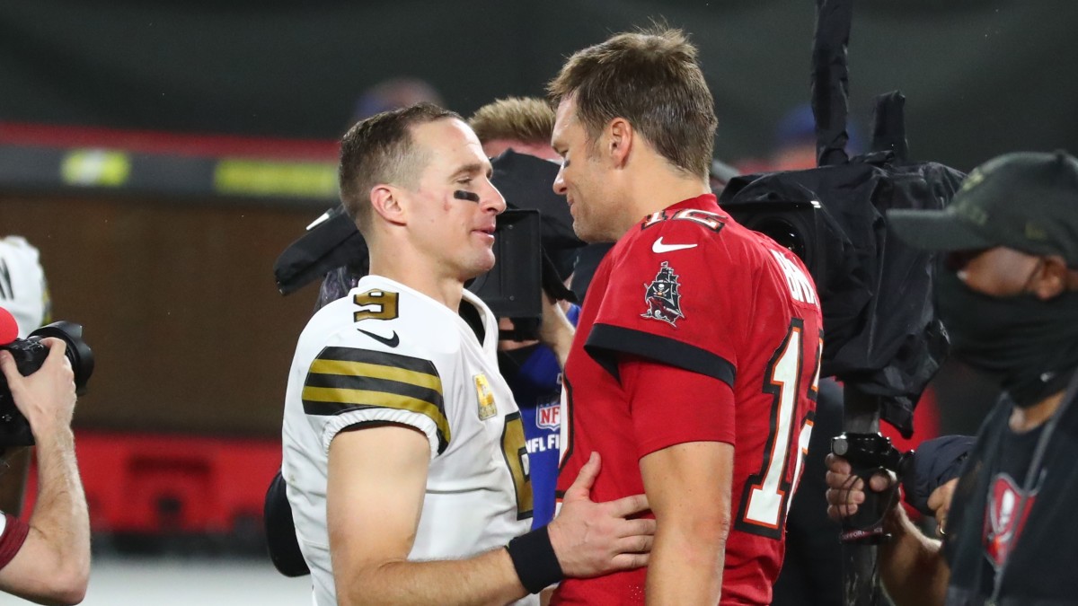 Tom Brady and Drew Brees meet on field following a game