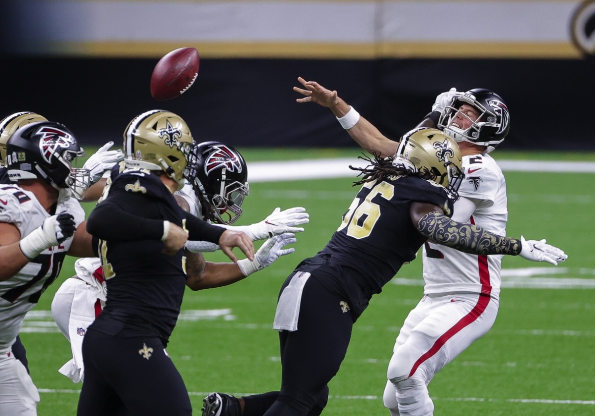 Nov 22, 2020; New Orleans, Louisiana, USA; Saints linebacker Demario Davis (56) hits Atlanta quarterback Matt Ryan (2) forcing an incomplete pass. Mandatory Credit: Derick E. Hingle-USA TODAY 