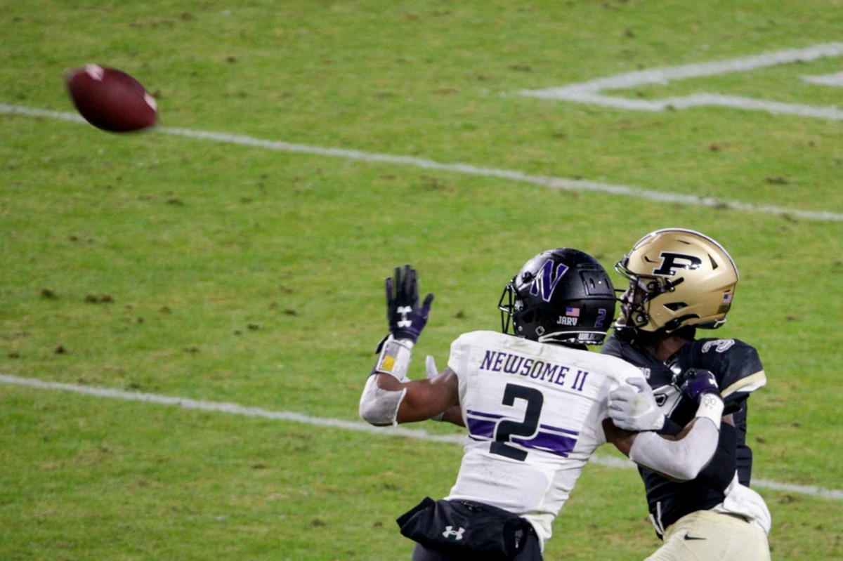 Purdue wide receiver David Bell (3) is guarded by Northwestern defensive back Greg Newsome II (2) © Nikos Frazier / Journal & Courier via Imagn Content Services, LLC