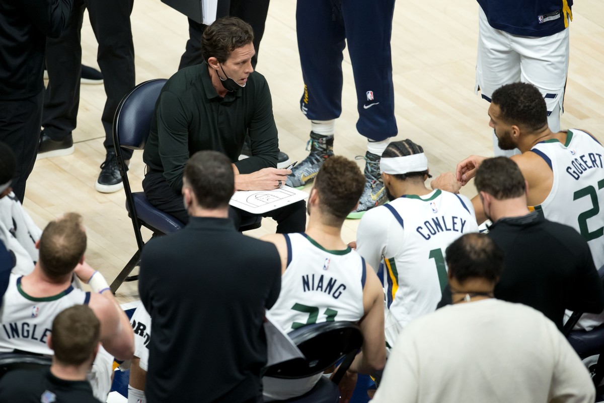 The Utah Jazz take instruction from Head Coach Quin Snyder during a timeout