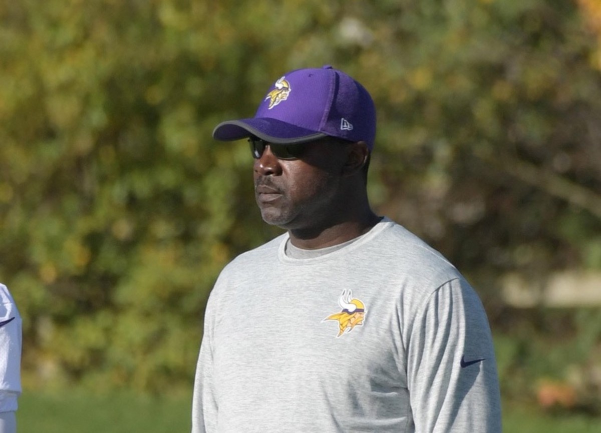 Minnesota Vikings cornerback Mackensie Alexander (20) and defensive backs coach Jerry Gray react during practice at the Hazelwood Centre.