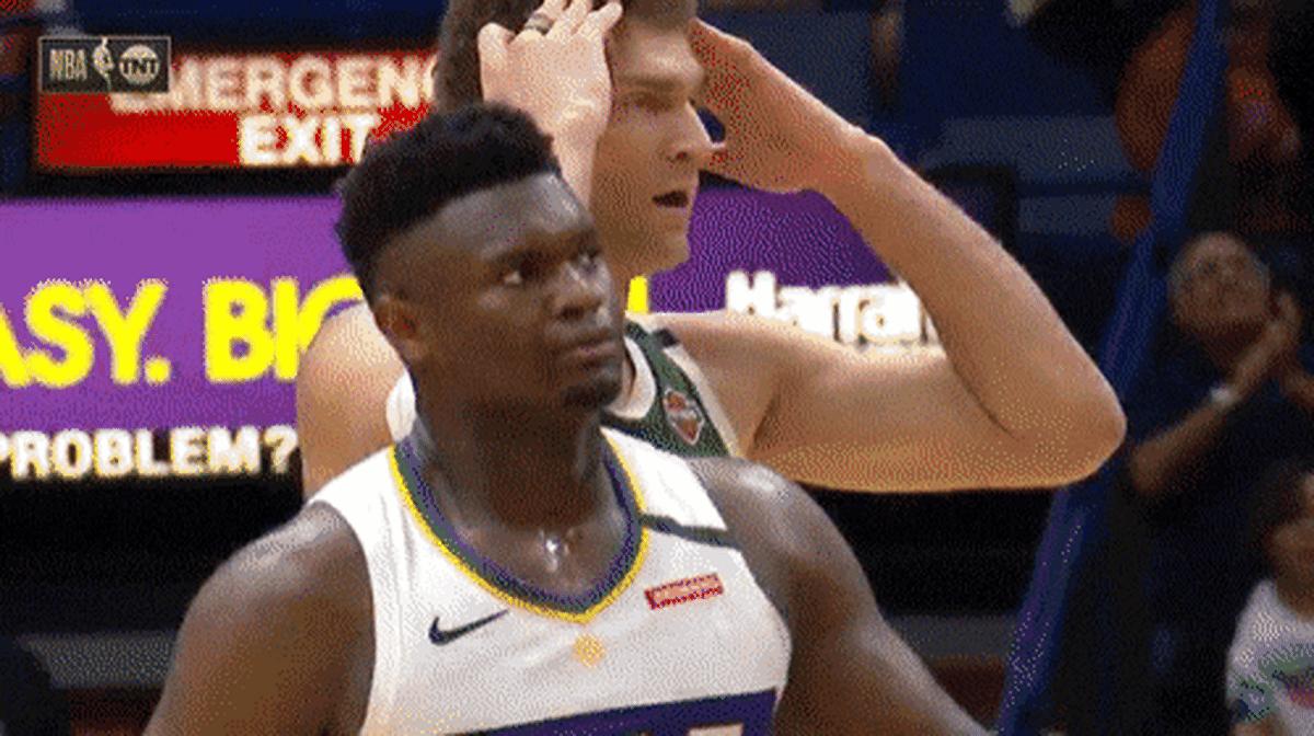 Brook Lopez reacts to Zion Williamson snatching a rebound from Giannis Antetokounmpo