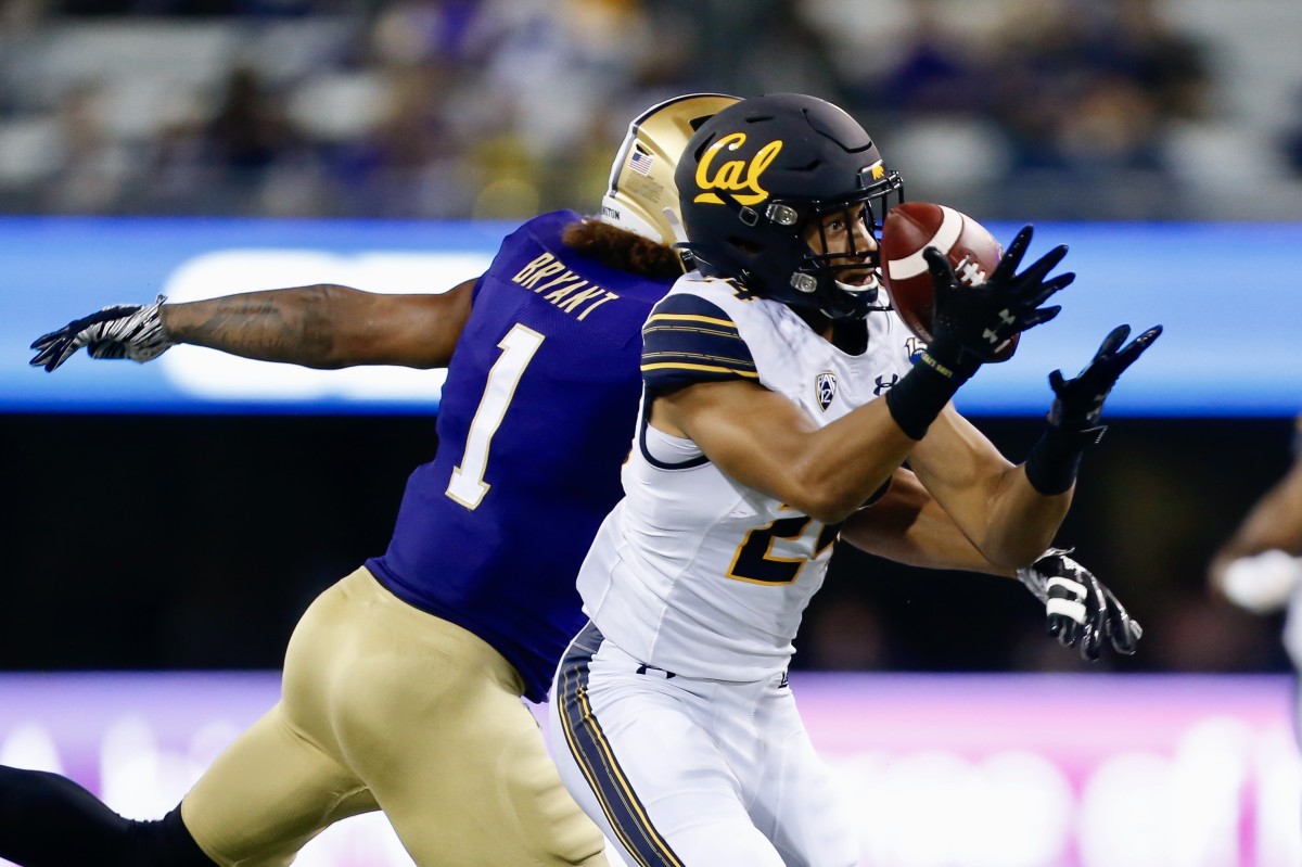 Cal cornerback Cam Bynum picks off a pass against Washington.