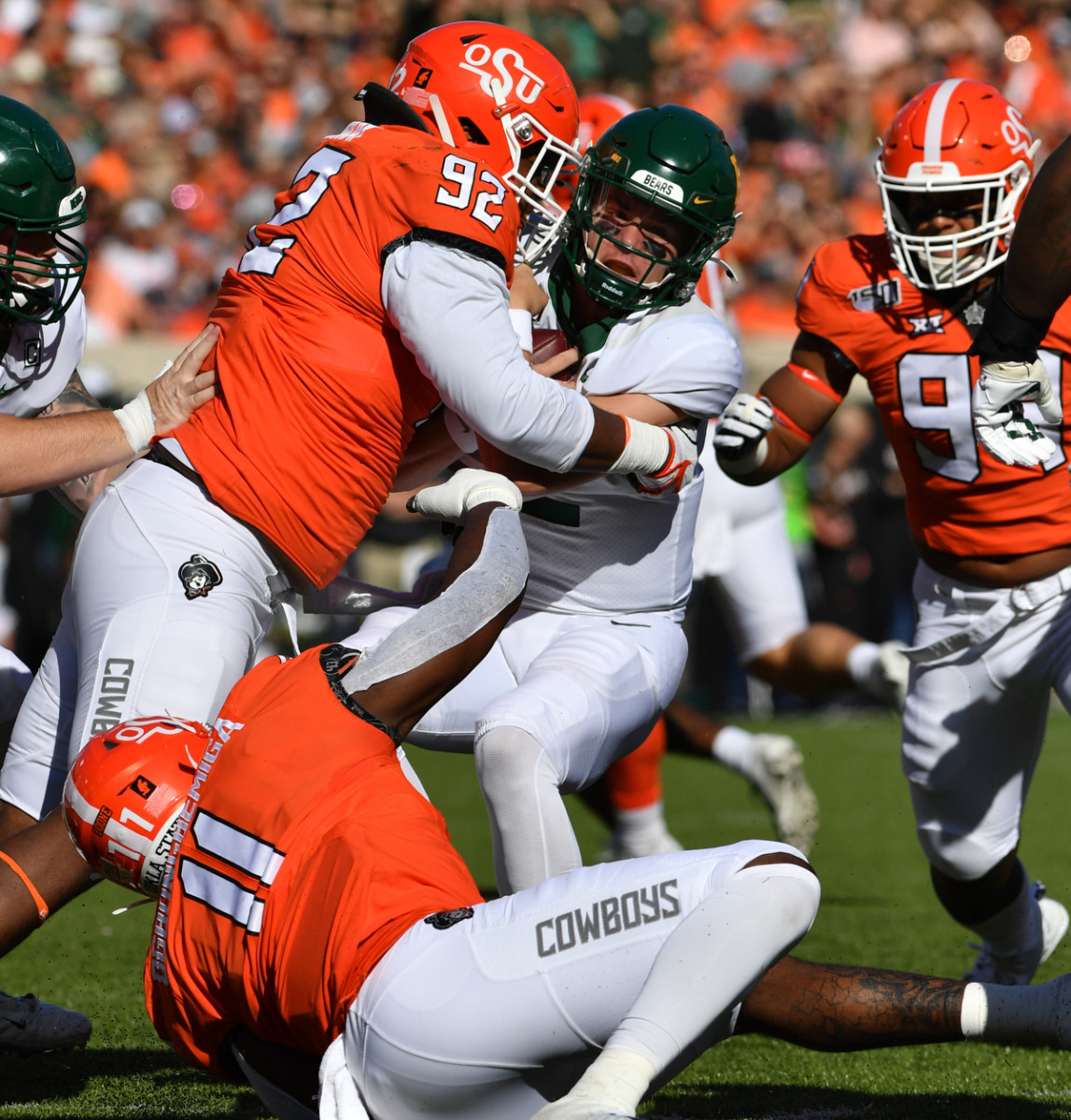 Cameron Murray (92) engulfs Baylor quarterback Charlie Brewer for one of his sacks last season.