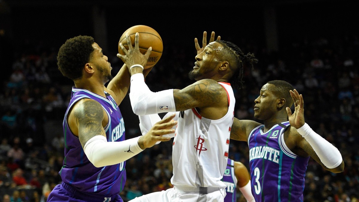 Defense swarms Hornets in Rockets' win