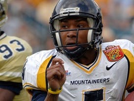 Former West Virginia QB Pat White retires from CFL - Sports Illustrated