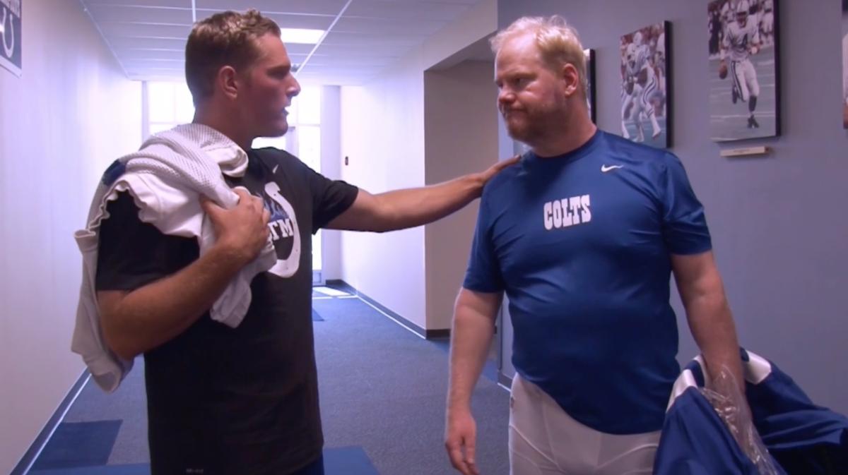 Indianapolis Colts punter Pat McAfee, while with the team in 2014, consoles stand-up comedian Jim Gaffigan after the comic was cut from the roster in a hilarious Colts.com video.