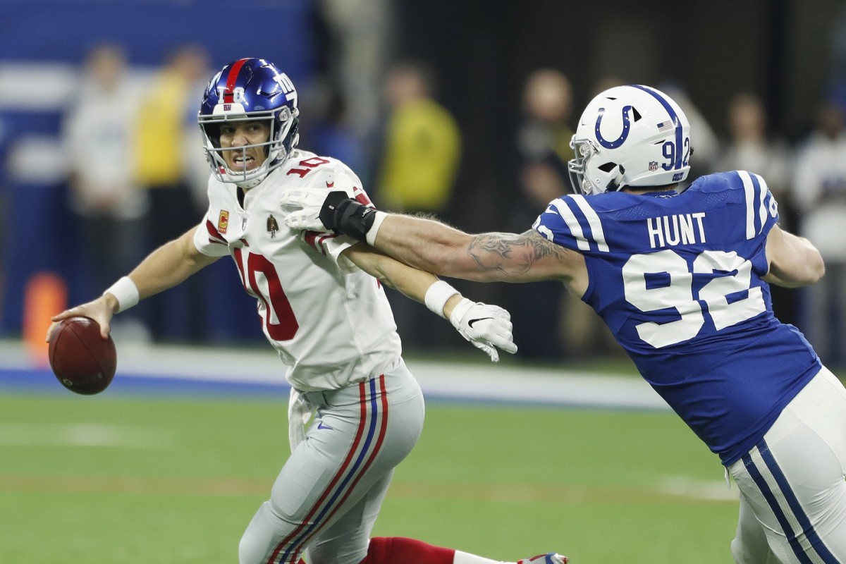 Saints DT Margus Hunt Chasing QB Eli Manning