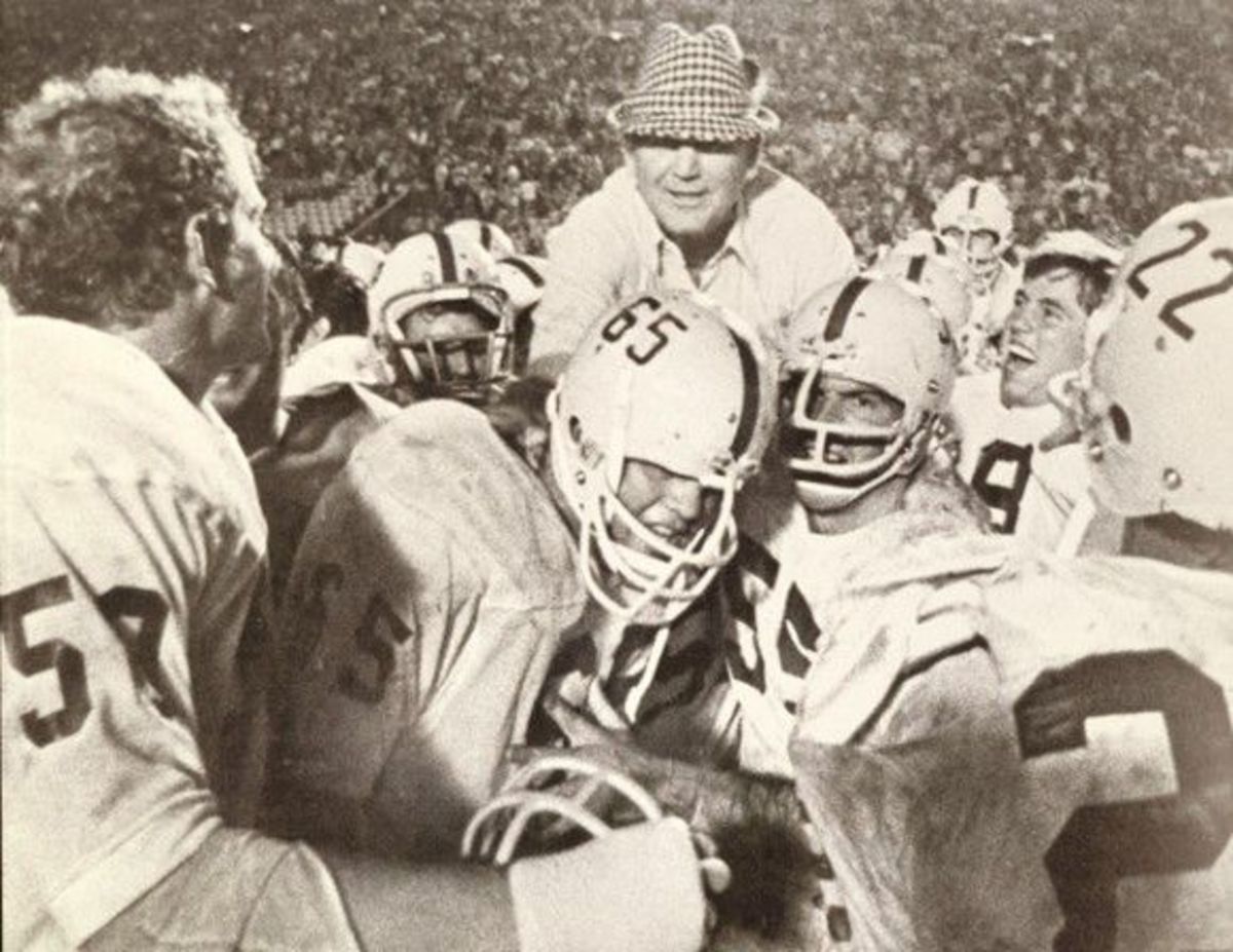 Alabama celebrates the 1971 victory over USC, won while wearing white helmets