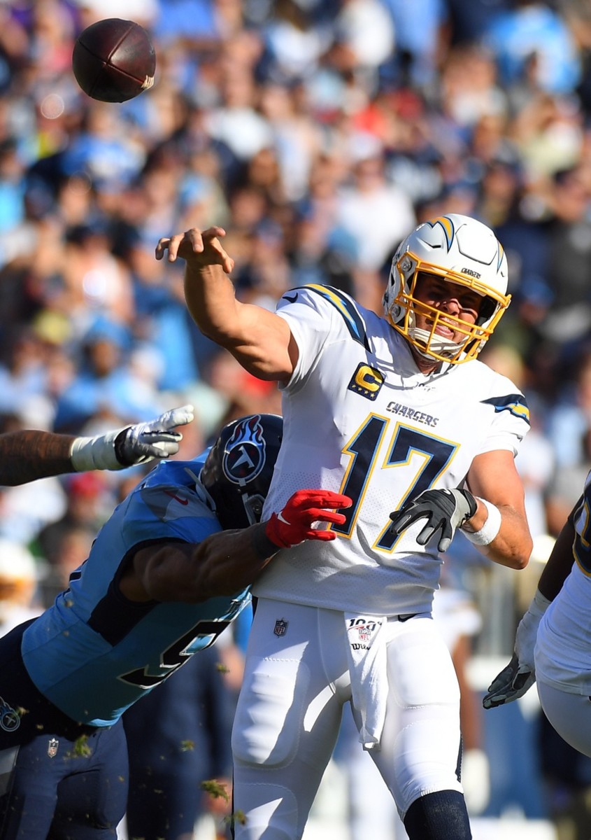 Los Angeles Chargers quarterback Philip Rivers (17) attempts a pass during the first half against the Tennessee Titans at Nissan Stadium.