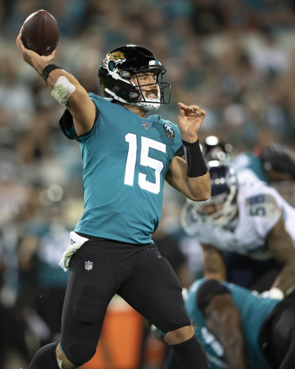 Jacksonville Jaguars quarterback Gardner Minshew (15) looks to pass during the first quarter against the Tennessee Titans at TIAA Bank Field.