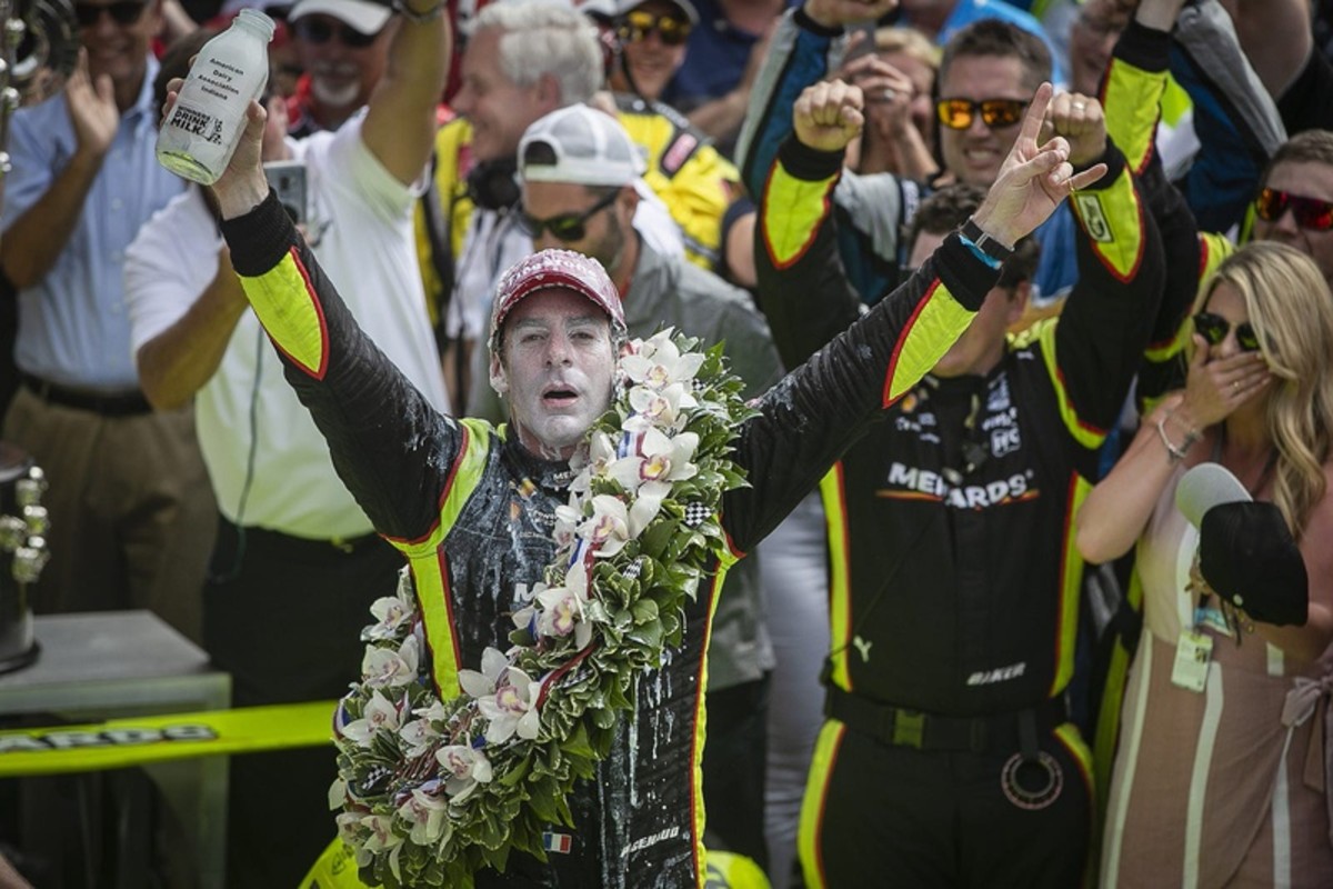 Frenchman Simon Pagenaud of Team Penske soaks up the milk and adulation in Victory Lane after winning the 2019 Indianapolis 500 at Indianapolis Motor Speedway.