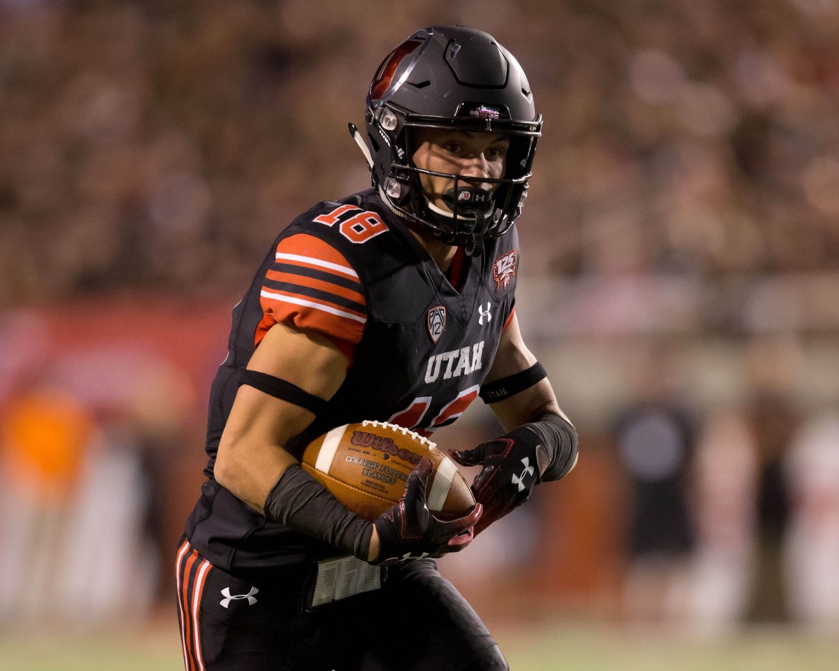 Sep 15, 2018; Salt Lake City, UT, USA; Utah Utes wide receiver Britain Covey (18) runs after a catch during the second half against the Washington Huskies at Rice-Eccles Stadium. Mandatory Credit: Russ Isabella-USA TODAY Sports