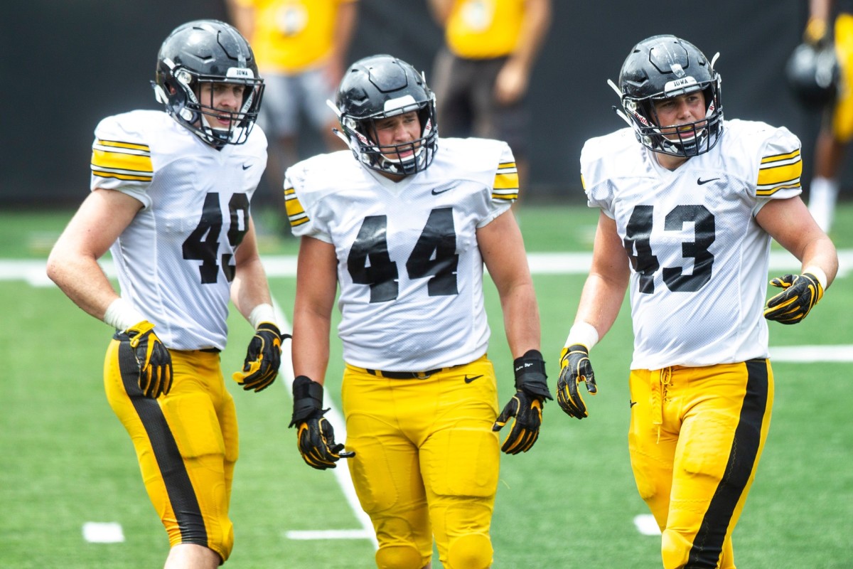 Iowa linebackers (from left) Nick Niemann, Seth Benson, and Dillon Doyle look to the sideline during last year's Kids Day scrimmage at Kinnick Stadium. (Joseph Cress/Iowa City Press-Citizen for USA Today Sports)