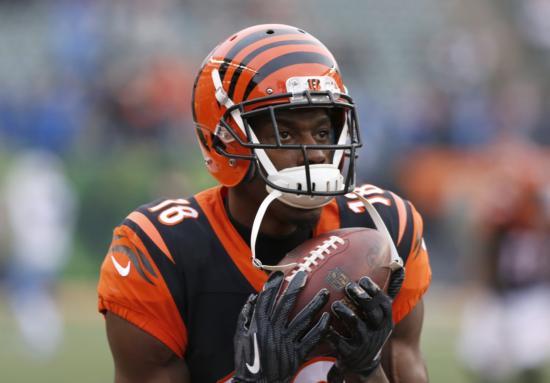 Cincinnati Bengals tight end C.J. Uzomah (87) lines up against the  Tennessee Titans during the second quarter of an NFL divisional playoff  football game, Saturday, Jan. 22, 2022, in Nashville, Tenn. (AP