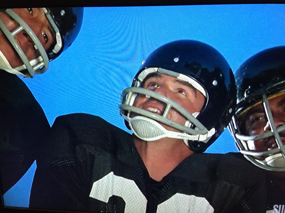 Sonny Sixkiller shared the huddle with Burt Reynolds.