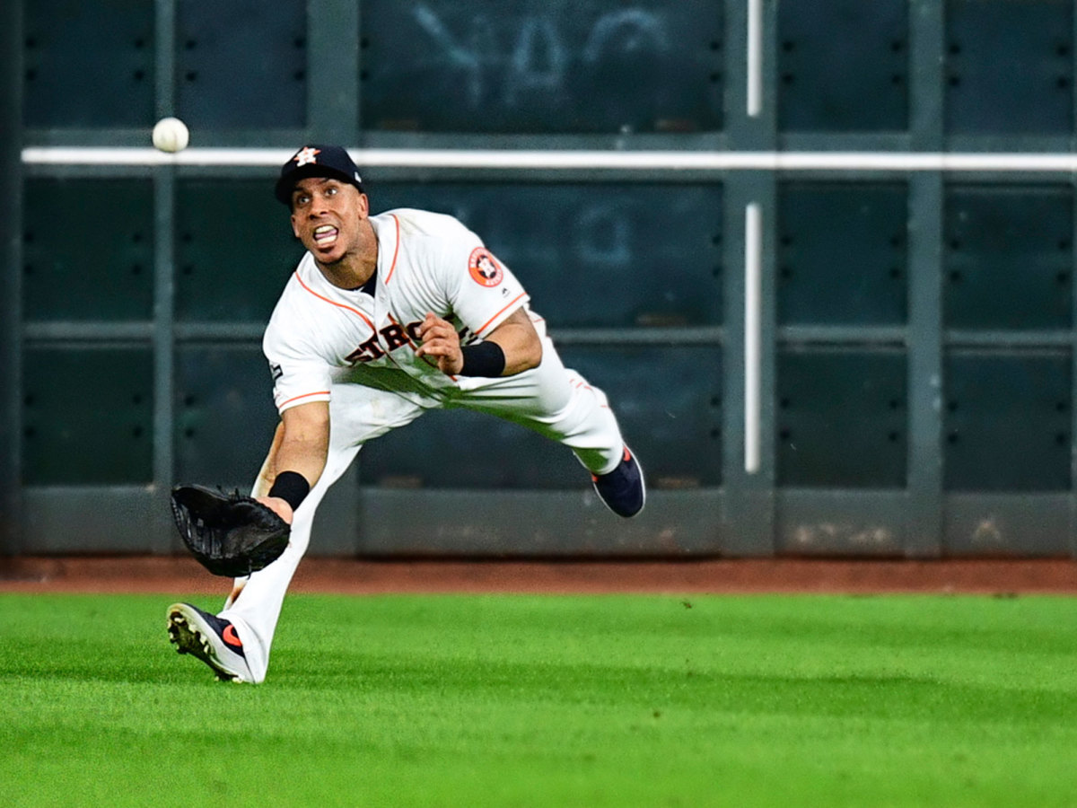 Michael Brantley diving for a ball